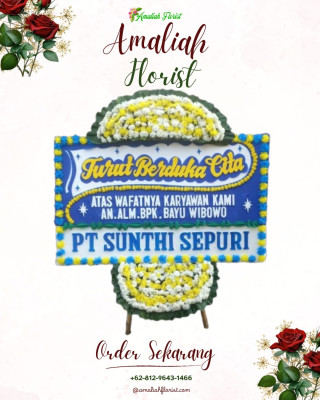 Papan Bunga Duka di Batang Natal